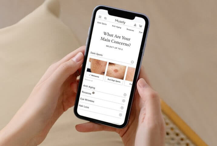 A woman browsing the Musely app on her phone