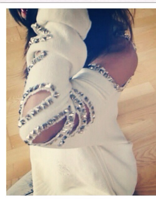 Reuse Those Old Jumpers By Cutting Some Slits In The Arms And Sticking