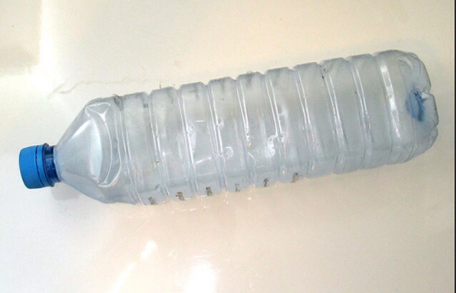 How To Make A Water Bottle Chandelier By Mandy Vandersteen Musely Start Off With A Regular Empty Water Bottle You Will Need Several