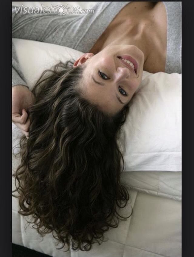 Applying Olive Oil To Your Hair And Putting Your Head Upside Down