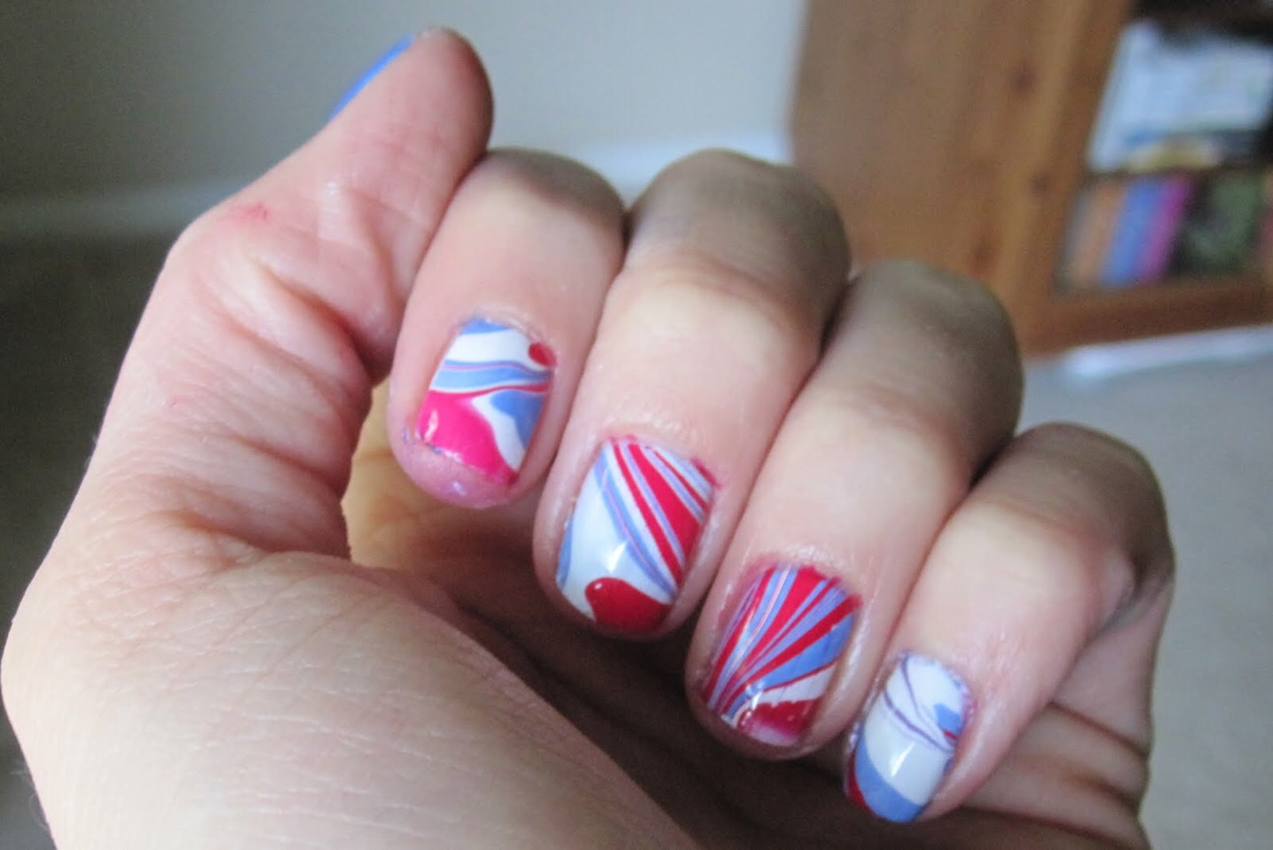 Soak freshly painted Nail Varnish in cold water for 2 minutes they